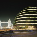 The London Authority building on the South side of the River Thames in London, England, with Tower Bridge in the background.