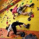 Students enjoying the climbing wall in some free time away from their studies.