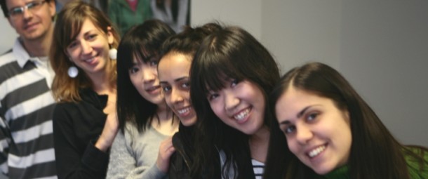 Students from Avalon School standing in a row smiling.